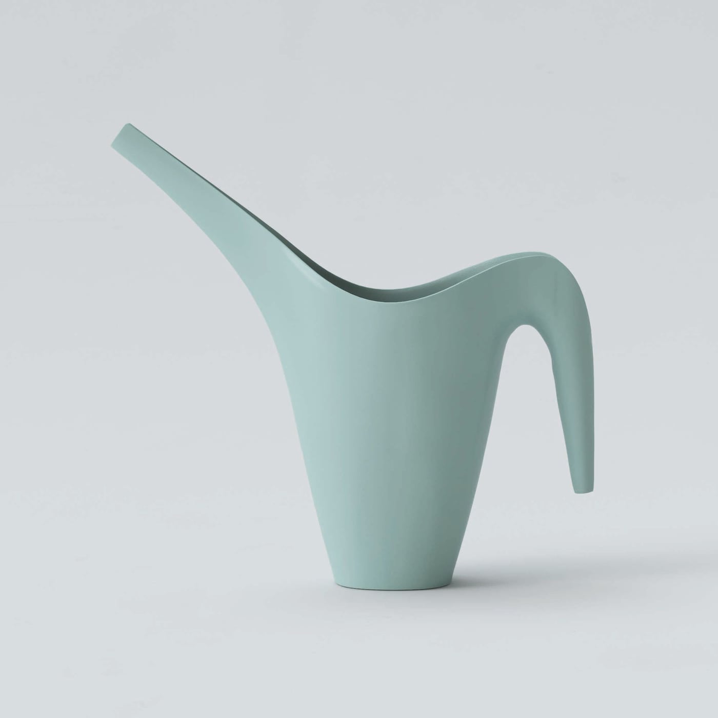 A light blue IKEA PS watering can.